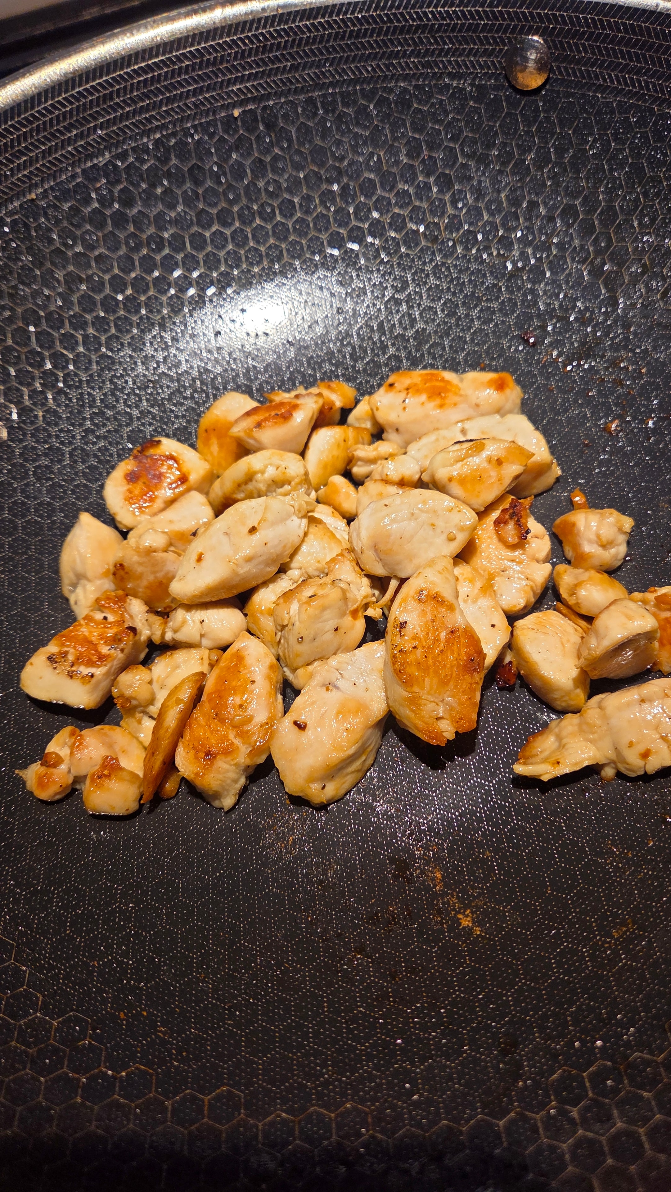 Pan-fried chicken pieces golden and cooked through