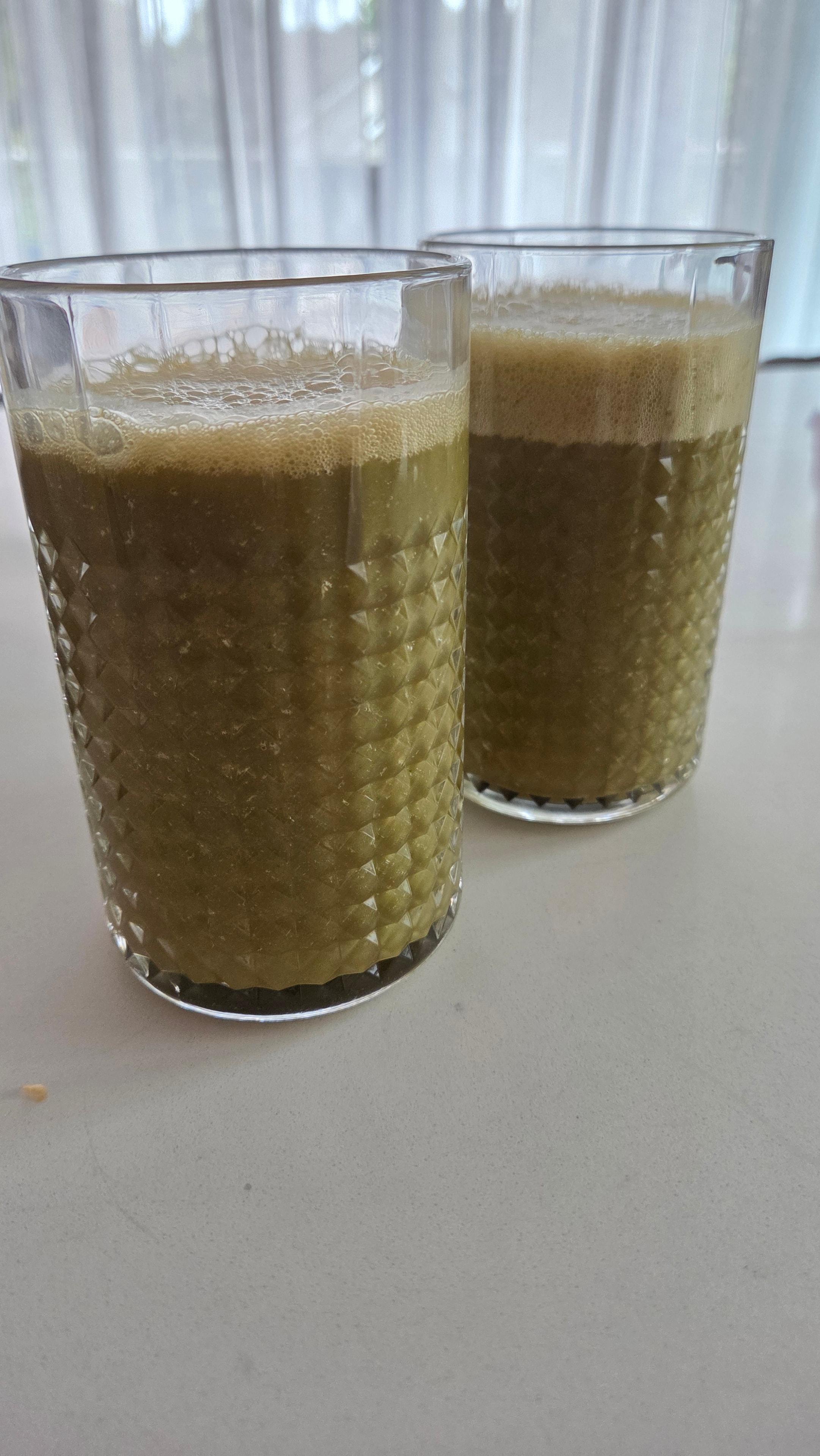 Two glasses of finished Watermelon with Some Fire Smoothie
